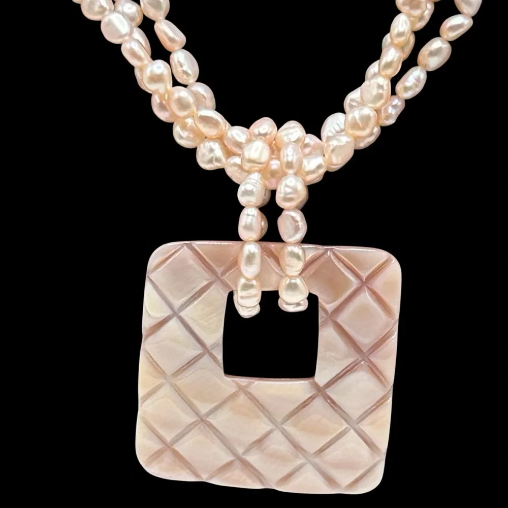 Triple Strand Pink Cultured Pearl Necklace Carved Shell Pendant